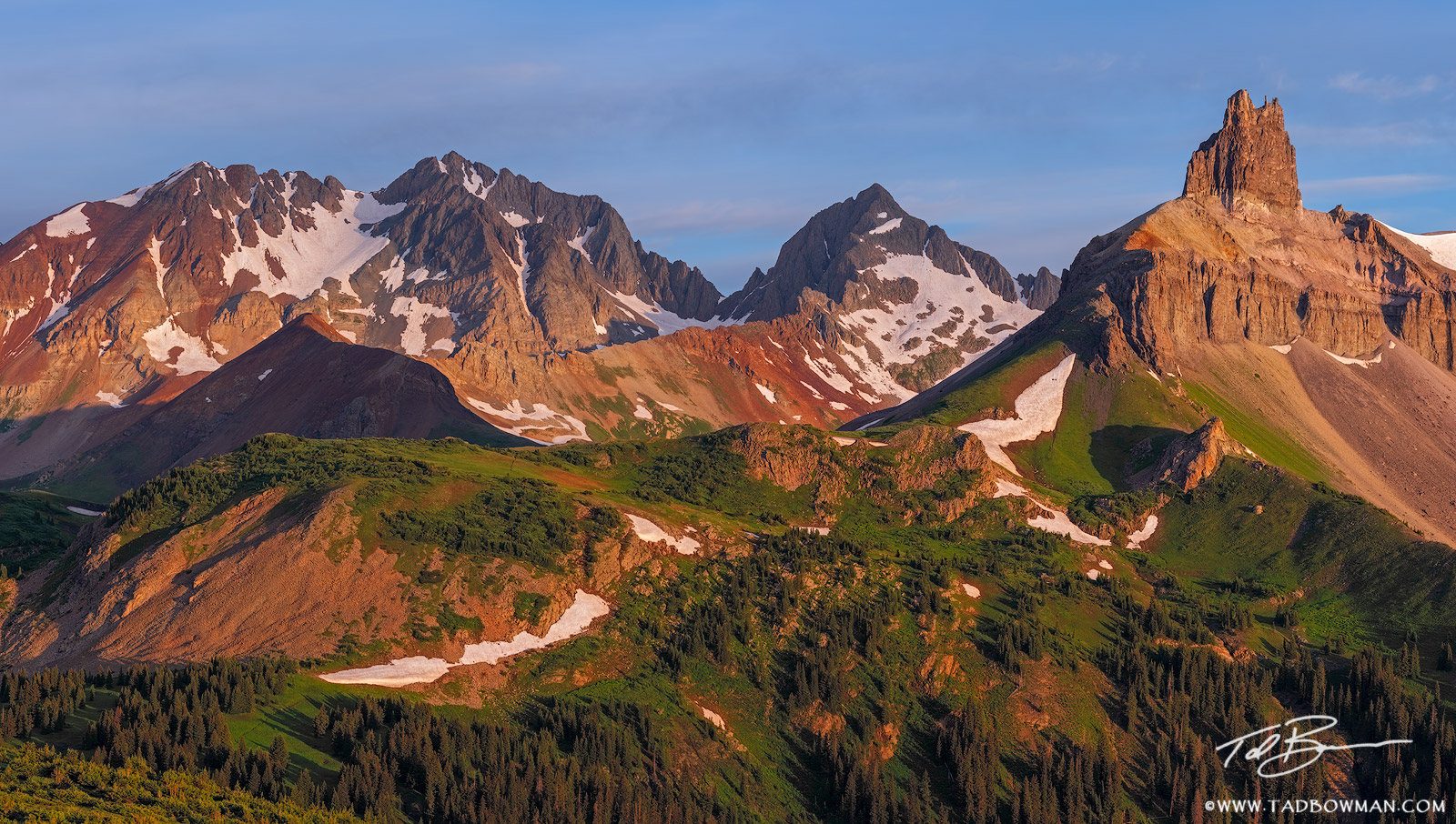 This Colorado panorama photo depicts sunrise on Lizard Head Peak, Mount Wilson, and Gladstone Peak in the Lizard Head Wilderness...
