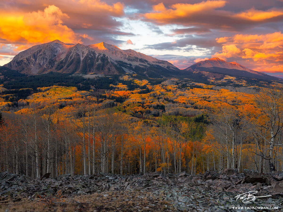 This Colorado mountain picture depicts a colorful autumn sunrise on the Beckwith Mountains in the Gunnison National Forest with...