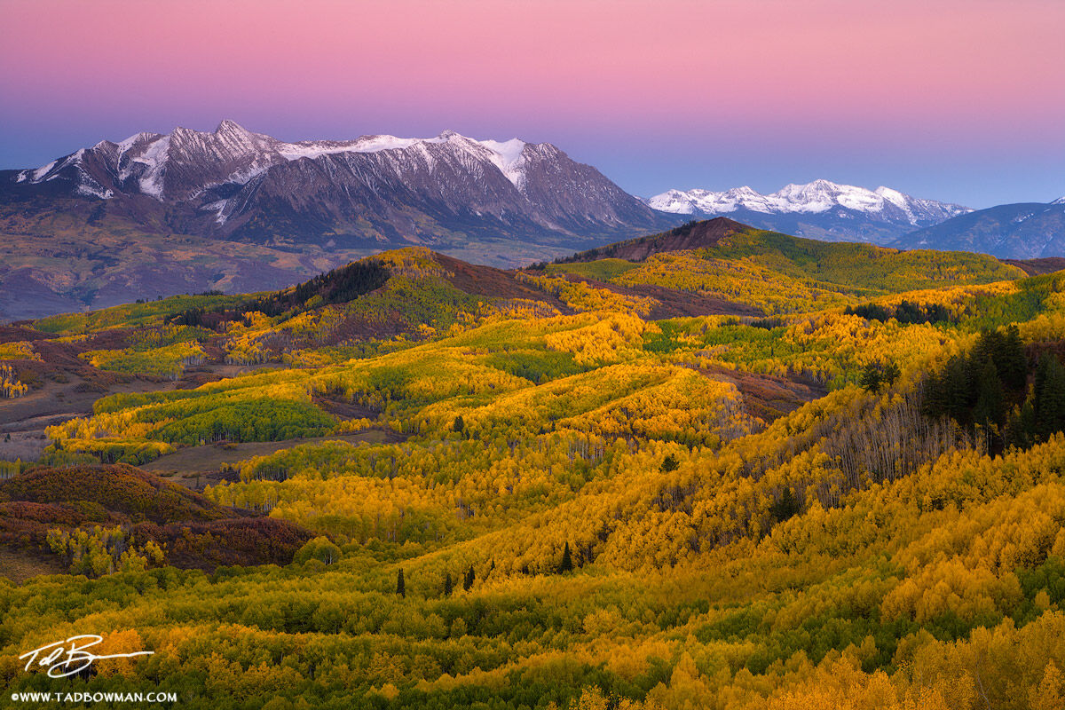 This Colorado mountain picture depicts earth's shadow over Chair Mountain with a colorful aspen forest foreground.