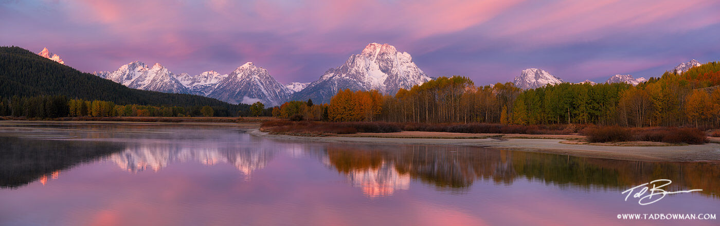 This Grand Teton fall photo depicts a colorful sunrise with colorful fall foliage situated at Oxbow Bend