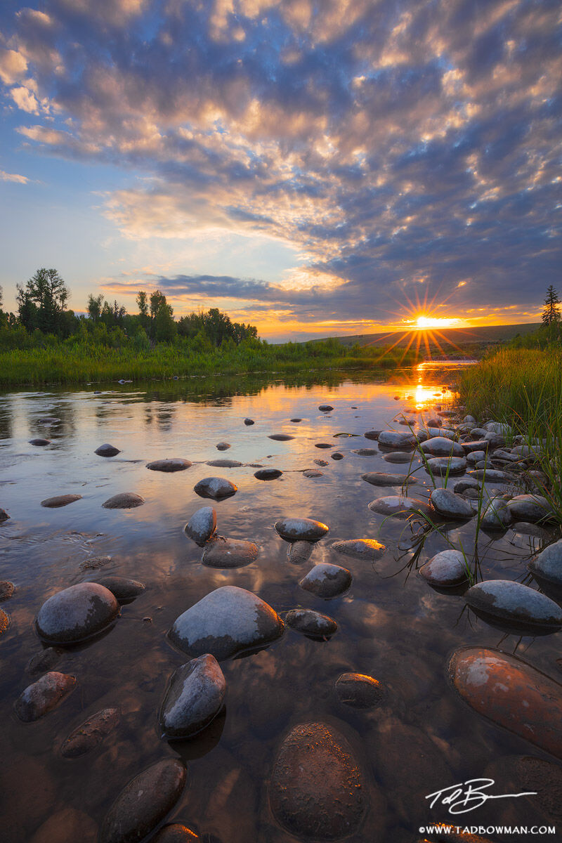 This Grand Teton National Park photo depicts sunrise over the Snake River with interesting cloud patterns above.&nbsp;