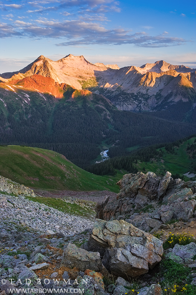 This Colorado mountain picture depicts a summer sunrise on Snowmass Peak in the White River National Forest.