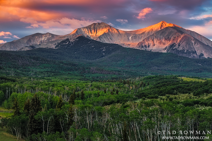 This Colorado mountain photo depicts sunrise with orange light on Mount Sopris