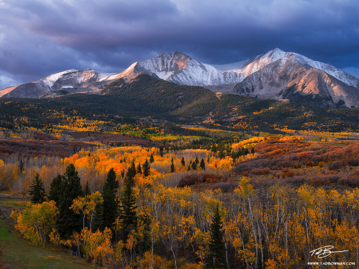 This Colorado fall photo depicts sunrise over Mount Sopris with colorful fall foliage in the foreground